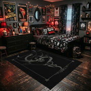 Minimal Serpent Skull Sigil Area Rug displayed beside a decorated bed