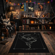 Minimal Serpent Skull Sigil Area Rug front view near a fireplace
