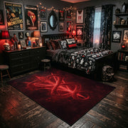 Red Inverted Pentagram Area Rug displayed beside a decorated bed