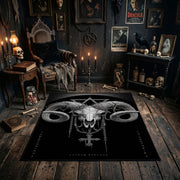 Horned Ram Skull Ritual Area Rug shown in a candlelit dark room