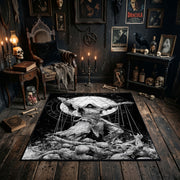 Horned Owl Forest Area Rug shown in a candlelit dark room