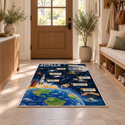 Moon Landing Journey Rug shown in an entryway near a wooden door