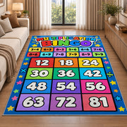 Multiplication grid rug beside a cream sofa and large windows