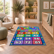 Multiplication grid rug in a bright room with a reading chair and storage cabinet