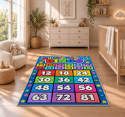 Multiplication grid rug in a nursery beside a dresser and crib
