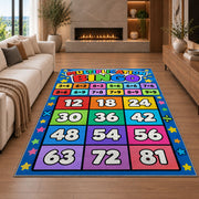 Multiplication grid rug in a seating area with a sofa and fireplace