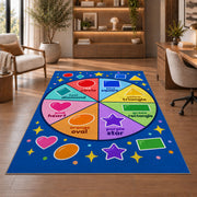Shapes and Colors Wheel Rug shown beside a lounge chair and wooden shelving