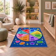 Shapes and Colors Wheel Rug shown in a nursery with a cot and soft toys
