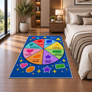 Shapes and Colors Wheel Rug shown beside a bed with neutral bedding
