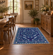 blue blue floral medallion area rug, close decorative detail