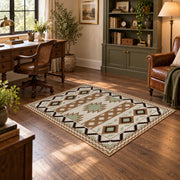 cream and black southwestern diamond pattern area rug, warm living room view
