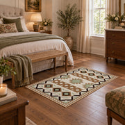 cream and black southwestern diamond pattern area rug, cozy home setting
