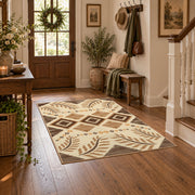 beige and brown botanical tribal pattern area rug, close decorative detail