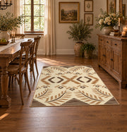 cream and tan rustic symbolic geometric pattern area rug, close decorative detail