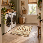 cream and tan rustic symbolic geometric pattern area rug, wide interior view