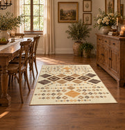 cream and tan patchwork kilim pattern area rug, warm living room view