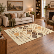 cream and tan patchwork kilim pattern area rug, angled room view
