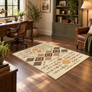 cream and tan patchwork kilim pattern area rug, wood floor styling
