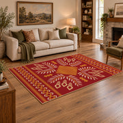 red and gold folk art floral pattern area rug, angled room view