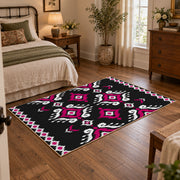 black and magenta tribal diamond pattern area rug, soft surface detail