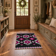 black and magenta tribal diamond pattern area rug, wide interior view