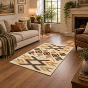 tan and orange zigzag tribal pattern area rug, ornamental detail view