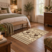 cream and brown ornamental scroll pattern area rug, cozy home setting