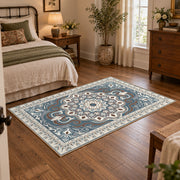 teal and gray ornate floral medallion area rug, full pattern view