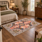 coral and blue decorative elephant and paisley motif area rug, full pattern view
