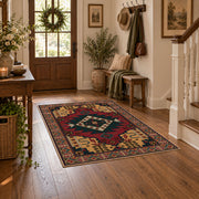 red and navy Persian inspired diamond medallion area rug, wood floor styling