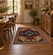 red and navy Persian inspired diamond medallion area rug, close decorative detail