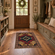 red and navy Persian inspired diamond medallion area rug, front room mockup