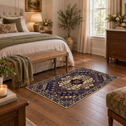 purple and gold ornate medallion pattern area rug, cozy home setting