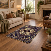 purple and gold ornate medallion pattern area rug, ornamental detail view