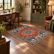 burnt orange and blue floral medallion pattern area rug, wood floor styling