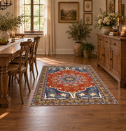 burnt orange and blue floral medallion pattern area rug, front room mockup