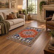 burnt orange and blue floral medallion pattern area rug, ornamental detail view