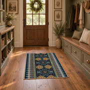 teal and red Persian inspired ornamental pattern area rug, wide interior view