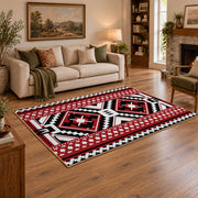 red black and white tribal cross geometric pattern area rug, angled room view
