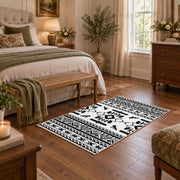 black and white tribal wildlife pattern area rug, cozy home setting