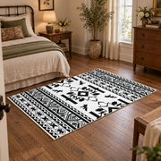 black and white tribal wildlife pattern area rug, full pattern view