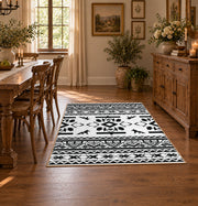 black and white tribal wildlife pattern area rug, close decorative detail