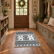 black and white tribal wildlife pattern area rug, front room mockup