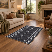 charcoal gray minimal diamond pattern area rug, ornamental detail view