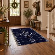 navy blue square geometric pattern area rug, wood floor styling