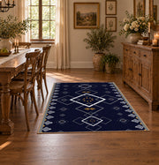 navy blue square geometric pattern area rug, close decorative detail