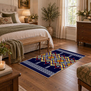 navy and multicolor tribal maze pattern area rug, cozy home setting