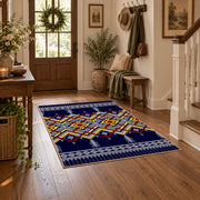 navy and multicolor tribal maze pattern area rug, wood floor styling