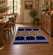 navy and multicolor tribal maze pattern area rug, close decorative detail