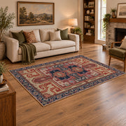 terracotta and blue distressed tribal pattern area rug, angled room view